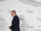 Australian Prime Minister Anthony Albanese leaves after speaking to the media at a press conference after attending the G7 Leaders' Summit in Kananaskis.