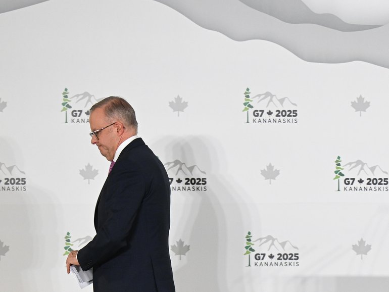 Australian Prime Minister Anthony Albanese leaves after speaking to the media at a press conference after attending the G7 Leaders' Summit in Kananaskis.