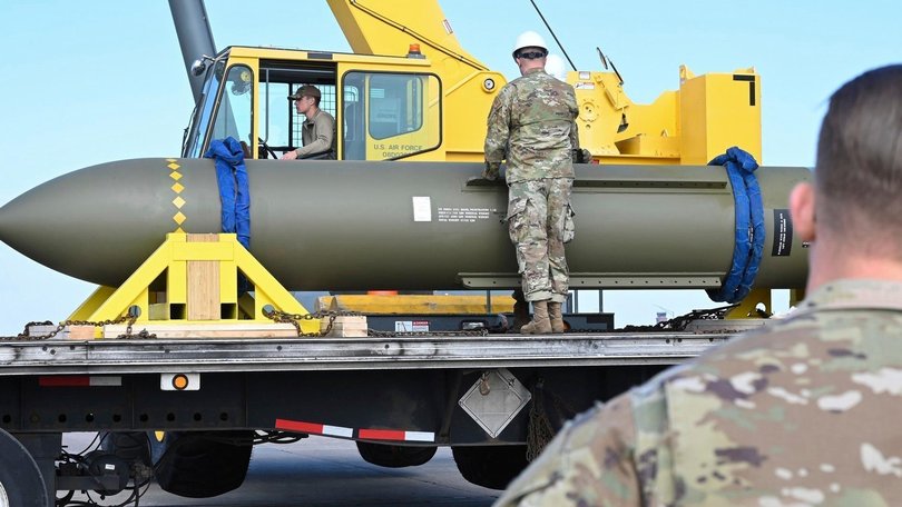 Airmen look at a GBU-57, or the Massive Ordnance Penetrator bomb, at Whiteman Air Base in Missouri in 2023.