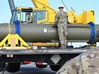 Airmen look at a GBU-57, or the Massive Ordnance Penetrator bomb, at Whiteman Air Base in Missouri in 2023.