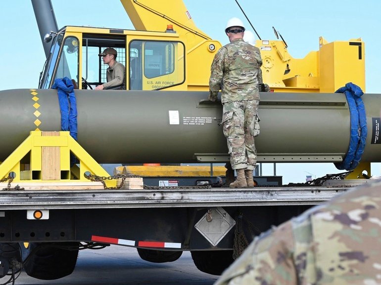 Airmen look at a GBU-57, or the Massive Ordnance Penetrator bomb, at Whiteman Air Base in Missouri in 2023.