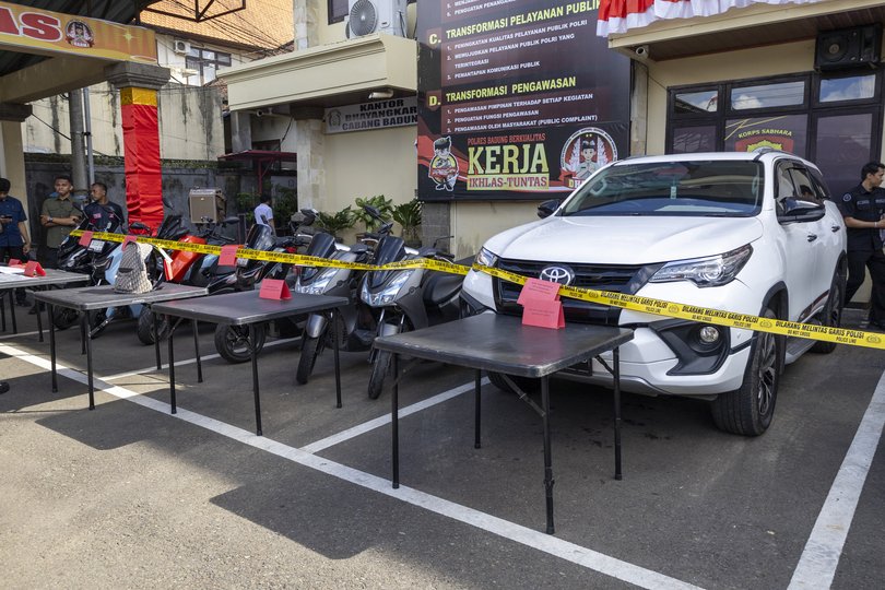 The suspects used motorbikes and two cars to flee after the deadly attack, police say.