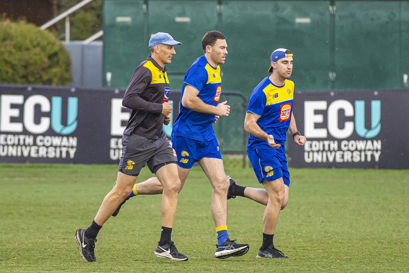McGovern (middle) has remained heavily involved at Eagles training.