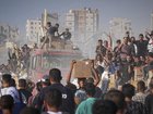 The United Nations agency for Palestinian refugees calls the system for providing aid "a disgrace". (AP PHOTO)