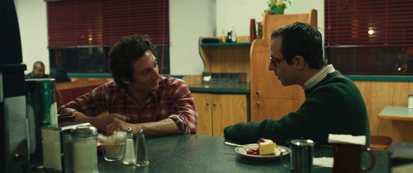 Jeremy Allen White as Bruce Springsteen and Jeremy Strong as Jon Landau in Springsteen: Deliver Me From Nowhere.