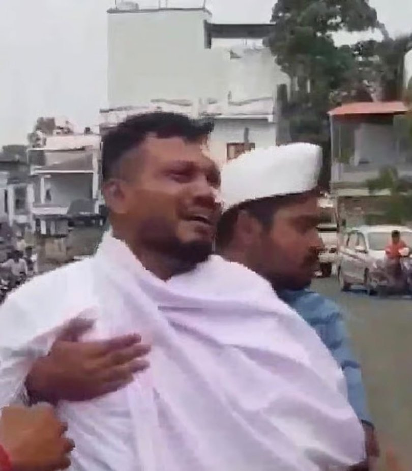 The tragic sole survivor of the Air India crash tragedy has today carried the coffin of his brother, who died in the devastating incident. British national Vishwash Kumar Ramesh, 40, from Leicester, had plasters on his face and was walking with a limp as he held up the casket of his sibling Ajay at the ceremony in Gujarat. The brothers were both onboard AI171, which last week crashed in a densely populated part of the west India city of Ahmedabad. Vishwash, who was sitting in seat 11A, escaped the wreckage moments before it was engulfed by flames. Picture: Unknown