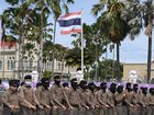 Thai police stand outside the Government House in Bangkok on June 19, 2025, in anticipation of Thai royalists protesting to call for the government's resignation.