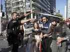 A woman is evacuated from the site of a direct hit from an Iranian missile strike in Ramat Gan, Israel.