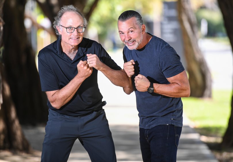 Former boxing champ Rai Fazio and Perrin Institute medical director David Blacker. Picture: Iain Gillespie