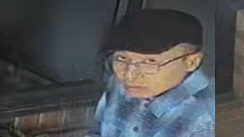 Police have released CCTV footage of the man they want to speak to after coffee was thrown on a baby.