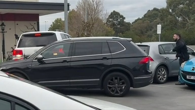 New vision shows the moment a four-wheel-drive sparked a shopping centre lockdown.