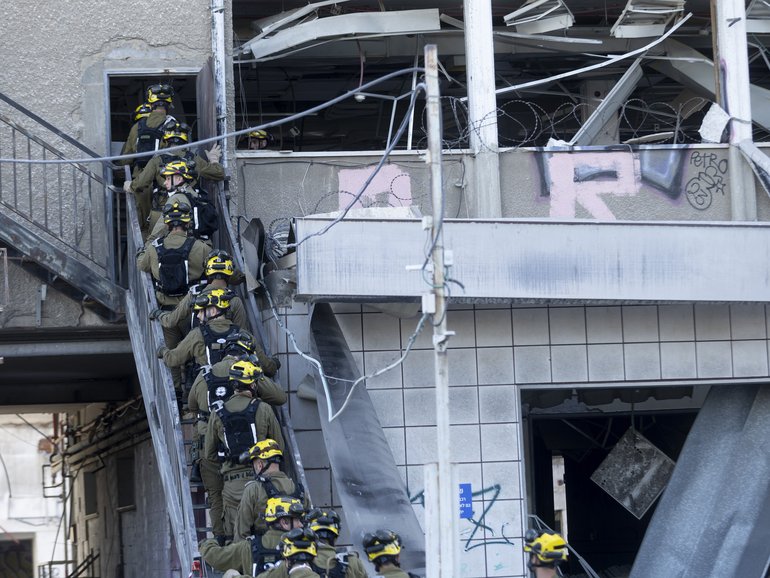 HAIFA, ISRAEL - JUNE 20: Emergency and rescue unit soldiers work at the site of a reported Iranian missile strike on June 20, 2025 in Haifa, Israel. Iran launched a retaliatory missile strike on Israel starting late on June 13, after a series of Israeli airstrikes earlier in the day targeted Iranian military and nuclear sites, as well as top military officials. (Photo by Amir Levy/Getty Images)