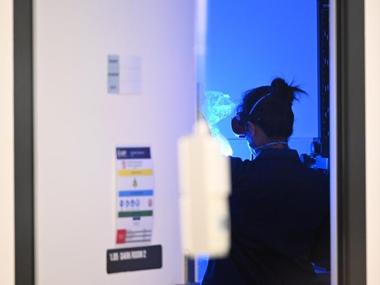 A state forensic lab had to pause routine DNA testing after discovering contamination issues. (Dean Lewins/AAP PHOTOS)
