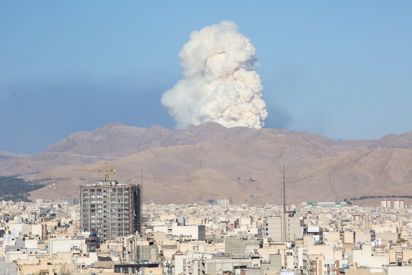 Smoke billows into the air after an Israeli air strike, seen from Tehran, Iran, on Wednesday, June 18, 2025.