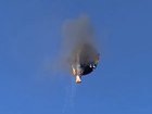 The hot air balloon and its basket burst into flames in Brazil.