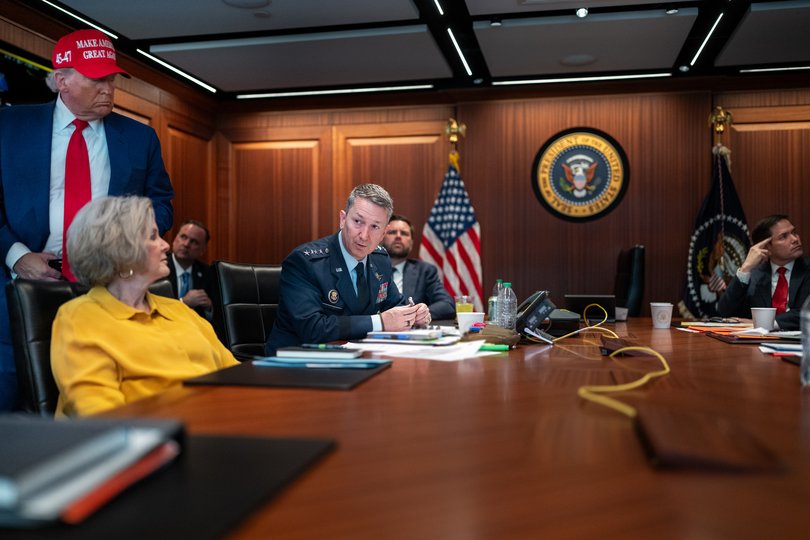 Mr Trump, White House Chief of Staff Susie Wiles and chairman of the Joint Chiefs of Staff Dan Caine.