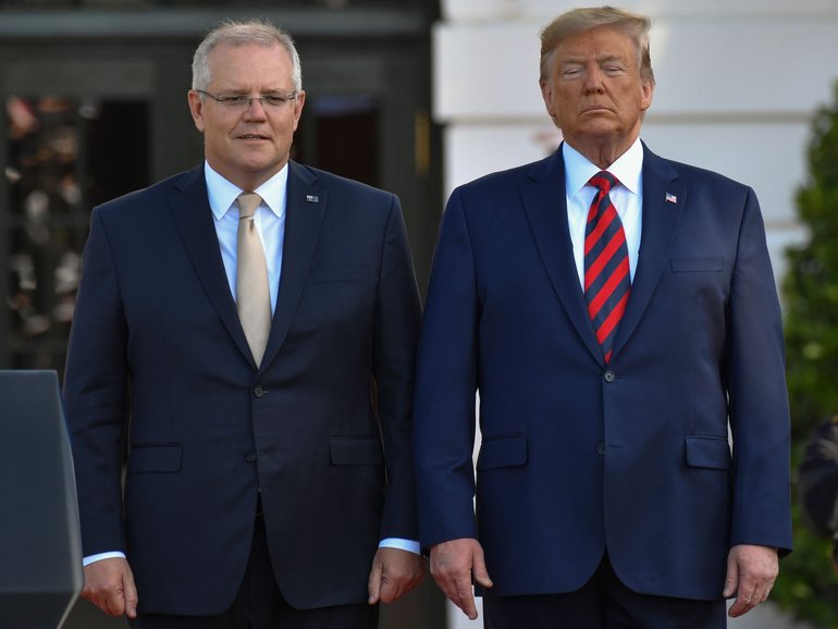 US President Donald Trump  stands with Scott Morrison in 2019. 