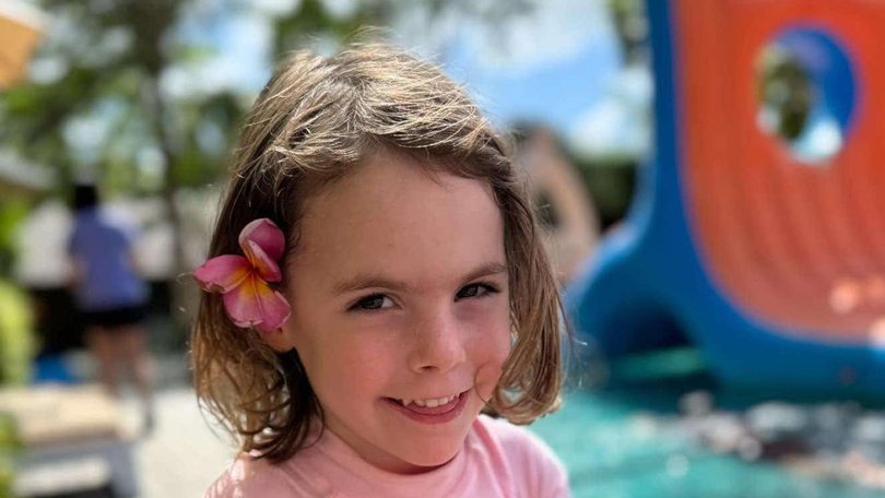 Marigold Jessie, 4, fights for life in an Adelaide hospital after falling from a tree house in Bali.