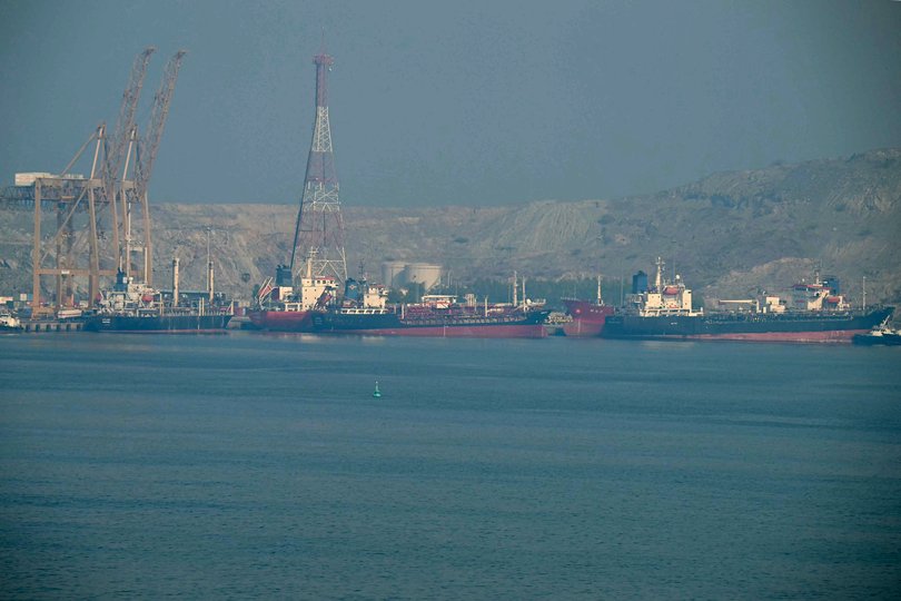 Tankers are seen at the Khor Fakkan Container Terminal, the only natural deep-sea port in the region and one of the major container ports in the Sharjah Emirate.