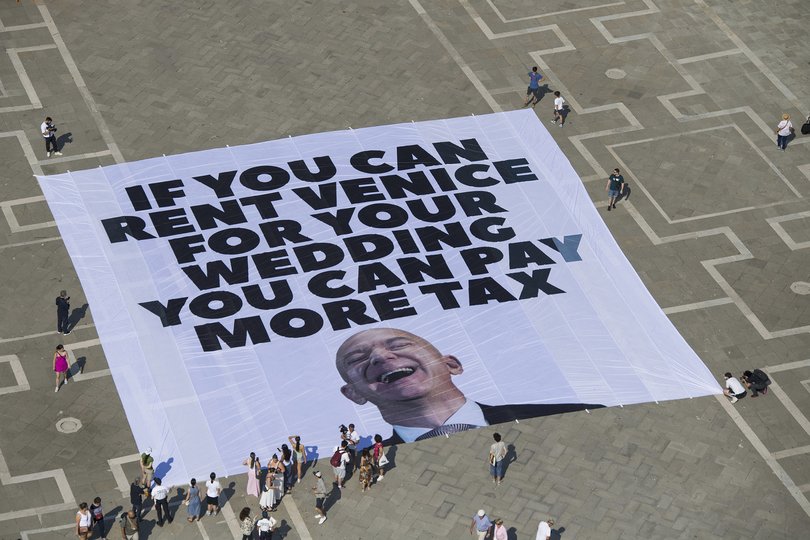 A large banner against Amazon founder Jeff Bezos' planned wedding.