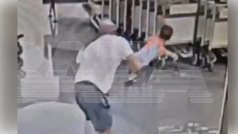The moment an 18-month-old boy was suddenly picked up and hurled headfirst onto the floor by a male tourist.