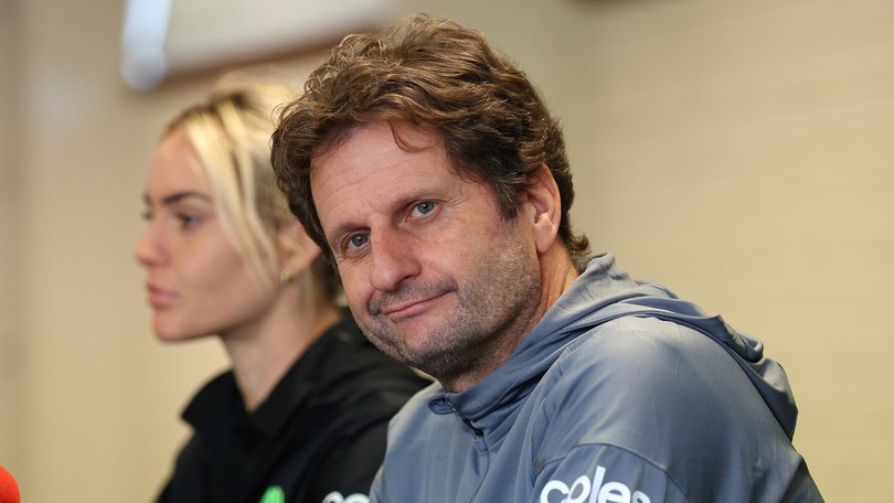 Joe Montemurro, coach of the Matildas looks on while talking to the media with Ellie Carpenter.
