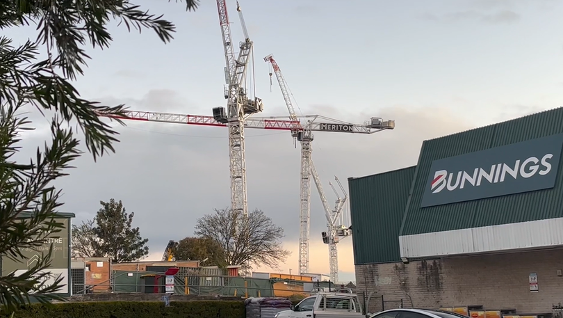 A busy Sydney road was closed over “a hazardous crane near the road”.