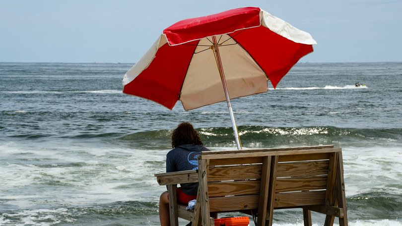 Rescuers had to use a bandsaw before they could fit the lifeguard into an ambulance.