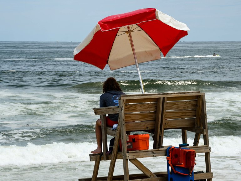 Rescuers had to use a bandsaw before they could fit the lifeguard into an ambulance.
