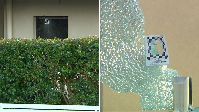 Bullets holes were left in windows and glass panels were shattered.