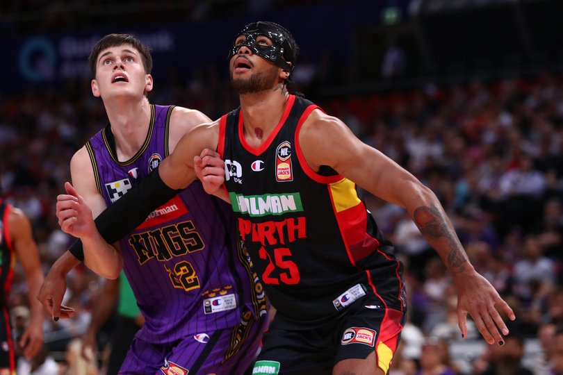 SYDNEY, AUSTRALIA - OCTOBER 15: Alex Toohey of the Kings and Keanu Pinder of the Wildcats during the round three NBL match between Sydney Kings and Perth Wildcats at Qudos Bank Arena on October 15, 2023 in Sydney, Australia. (Photo by Jason McCawley/Getty Images)