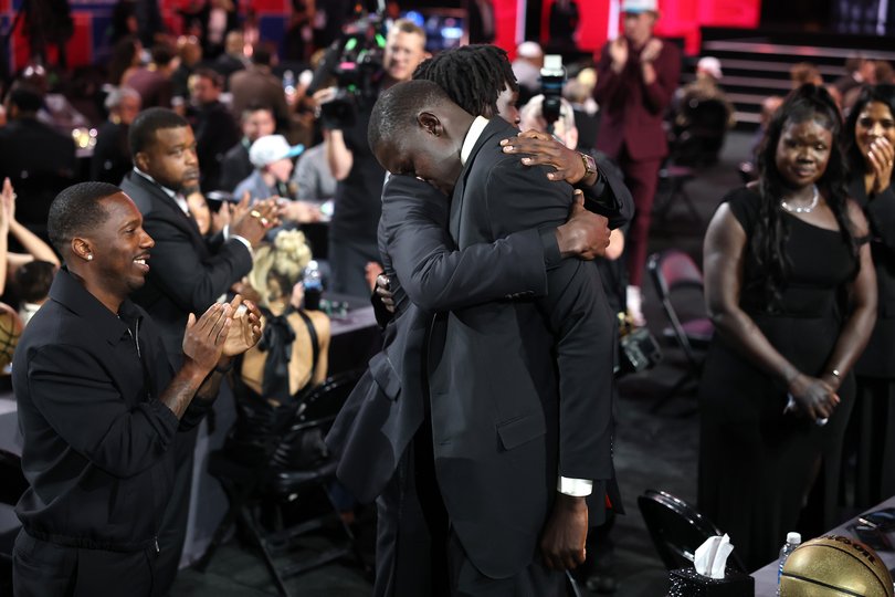NEW YORK, NEW YORK - JUNE 25: Khaman Maluach celebrates with people sitting at his table after being drafted tenth overall by the Houston Rockets during the first round of the 2025 NBA Draft at Barclays Center on June 25, 2025 in the Brooklyn borough of New York City. NOTE TO USER: User expressly acknowledges and agrees that, by downloading and/or using this photograph, user is consenting to the terms and conditions of the Getty Images License Agreement. (Photo by Sarah Stier/Getty Images) *** BESTPIX ***