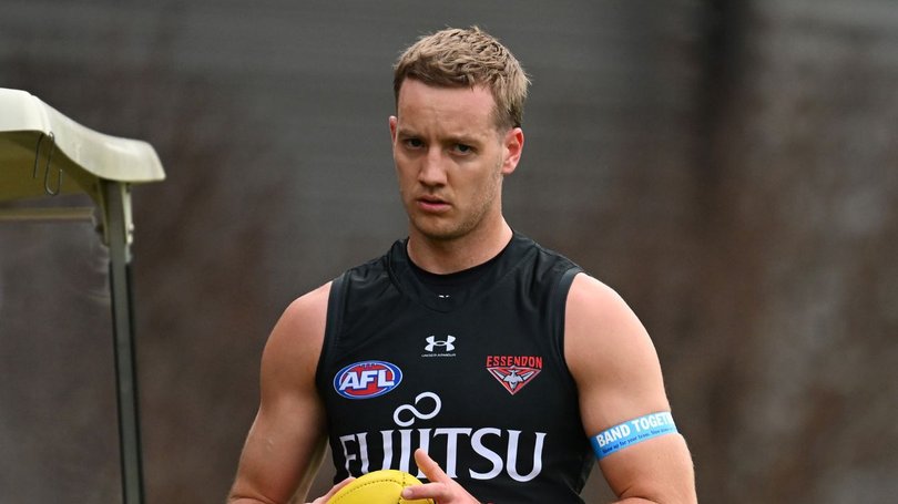 There are fresh fears for Essendon midfielder Darcy Parish after he appeared to injure his calf at training.