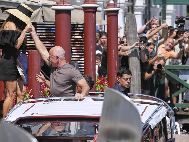 Jeff Bezos and Lauren Sanchez's three-day gala in Venice is estimated to cost about $A76 million. (AP PHOTO)