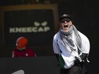 ‘Glastonbury, I'm a free man,’ Kneecap frontman Mo Chara told the audience while wearing a keffiyeh. (AP PHOTO)