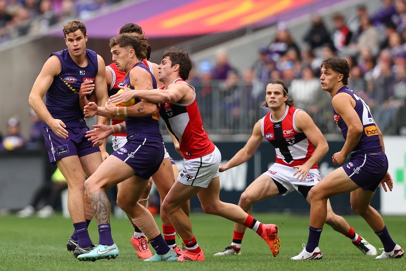 PERTH, AUSTRALIA - JUNE 29: Luke Jackson of the Dockers gets tackled by Jack Steele of the Saints during the round 16 AFL match between Fremantle Dockers and St Kilda Saints at Optus Stadium on June 29, 2025 in Perth, Australia. (Photo by Paul Kane/Getty Images via AFL Photos)