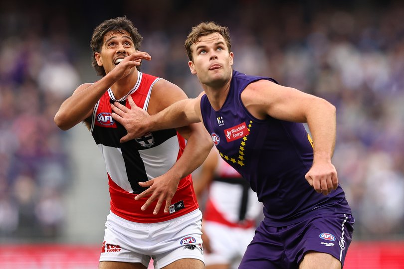 PERTH, AUSTRALIA - JUNE 29: Isaac Keeler of the Saints and Sean Darcy of the Dockers contest the ruck during the round 16 AFL match between Fremantle Dockers and St Kilda Saints at Optus Stadium on June 29, 2025 in Perth, Australia. (Photo by Paul Kane/Getty Images via AFL Photos)