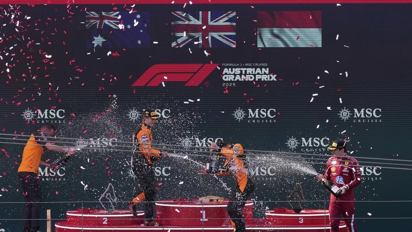 Podium joy for Oscar Piastri (L), McLaren teammate and winner Lando Norris (C) and Charles Leclerc. (AP PHOTO)