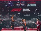 Podium joy for Oscar Piastri (L), McLaren teammate and winner Lando Norris (C) and Charles Leclerc.  (AP PHOTO)