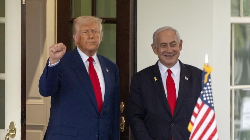 Donald Trump has again taken to social media in defence of Israeli leader Benjamin Netanyahu. (AP PHOTO)