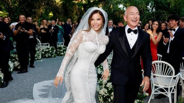 AARON PATRICK: In an era of lavish weddings, Amazon founder Jeff Bezos spent a tiny slice of his wealth to marry television host Lauren Sanchez.