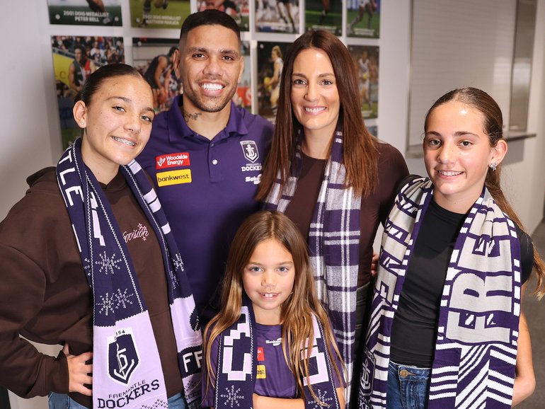 Michael Walters with wife Marnie and children Laila 13, Mackenzie 7 and Addison 11 at Thursday’s retirement press conference.