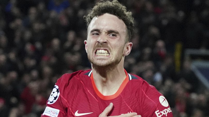 Liverpool's Diogo Jota celebrates after scoring his side's first goal during the Champions League group B soccer match between Liverpool and Atletico Madrid in Liverpool, England, Wednesday, Nov. 3, 2021.(AP Photo/Jon Super)