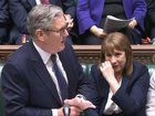 Chancellor of the Exchequer Rachel Reeves (right) crying as Prime Minister Sir Keir Starmer speaks during Prime Minister's Questions in the House of Commons.