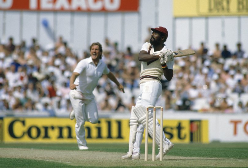 West Indies batsman Viv Richards hooks a delivery from Ian Botham of England, only to be caught in the deep for 8 runs, during the 5th Test match between England and West Indies at The Oval, London, 9th August 1984. West Indies won the match by 172 runs and took the series 5-0. (Photo by Patrick Eagar/Popperfoto via Getty Images)