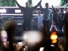 Liam and Noel Gallagher have opened their reunion tour with a concert in Cardiff, Wales. (AP PHOTO)