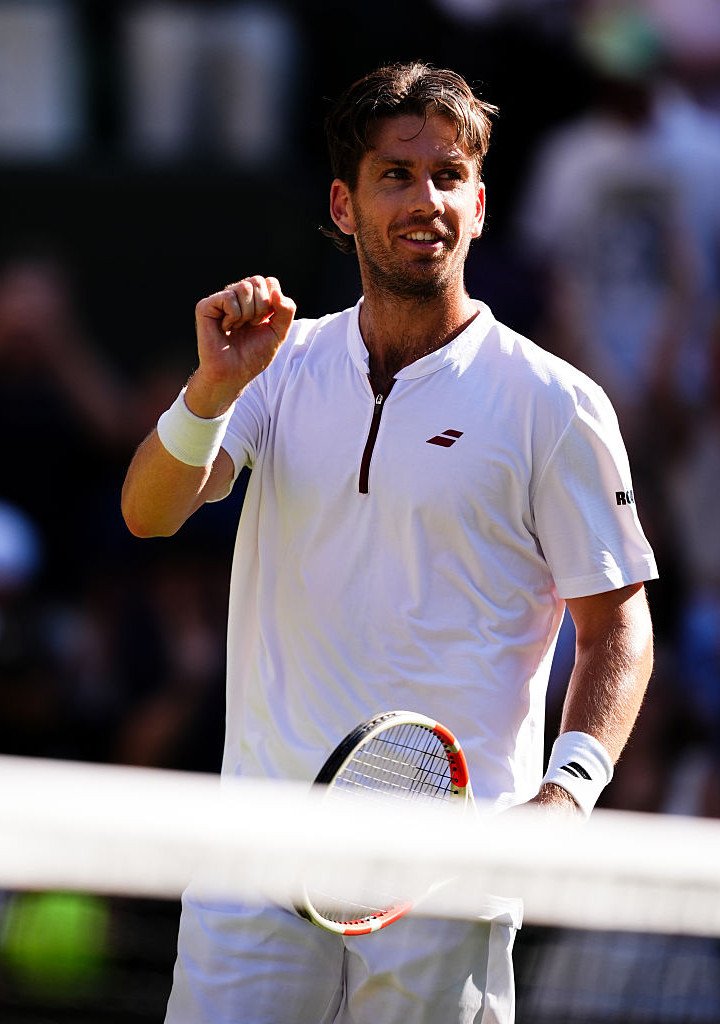 Cameron Norrie celebrates winning his match against Mattia Bellucci on Day 5 at Wimbledon.