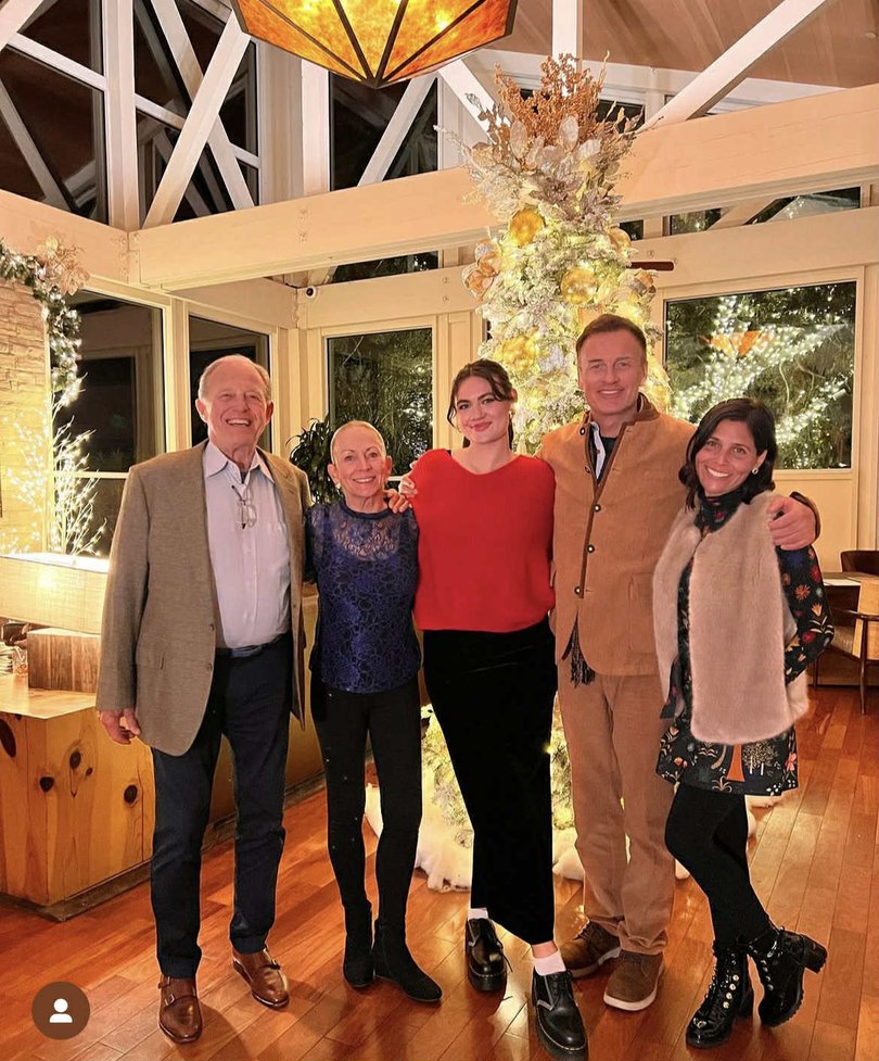 Madison and Julian were seen here posing together in a family photo, which she shared online.