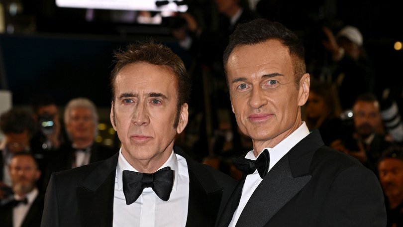 Nicolas Cage and Julian McMahon attend the "The Surfer" Red Carpet at the 77th annual Cannes Film Festival at Palais des Festivals on May 17, 2024.