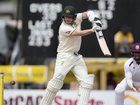 Steve Smith has scored a half century as Australia look to stretch their lead over West Indies. (AP PHOTO)